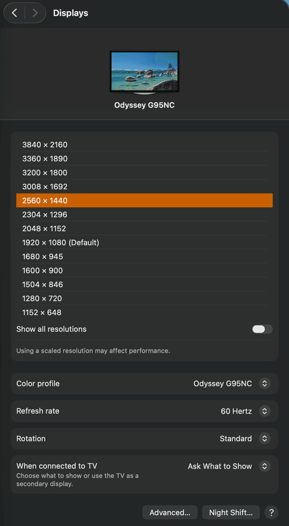 macOS System Settings, Displays, for a connected external monitor showing the resolution list with 2560 by 1440 selected, plus Color profile, Refresh rate 60 Hertz, and Rotation controls.