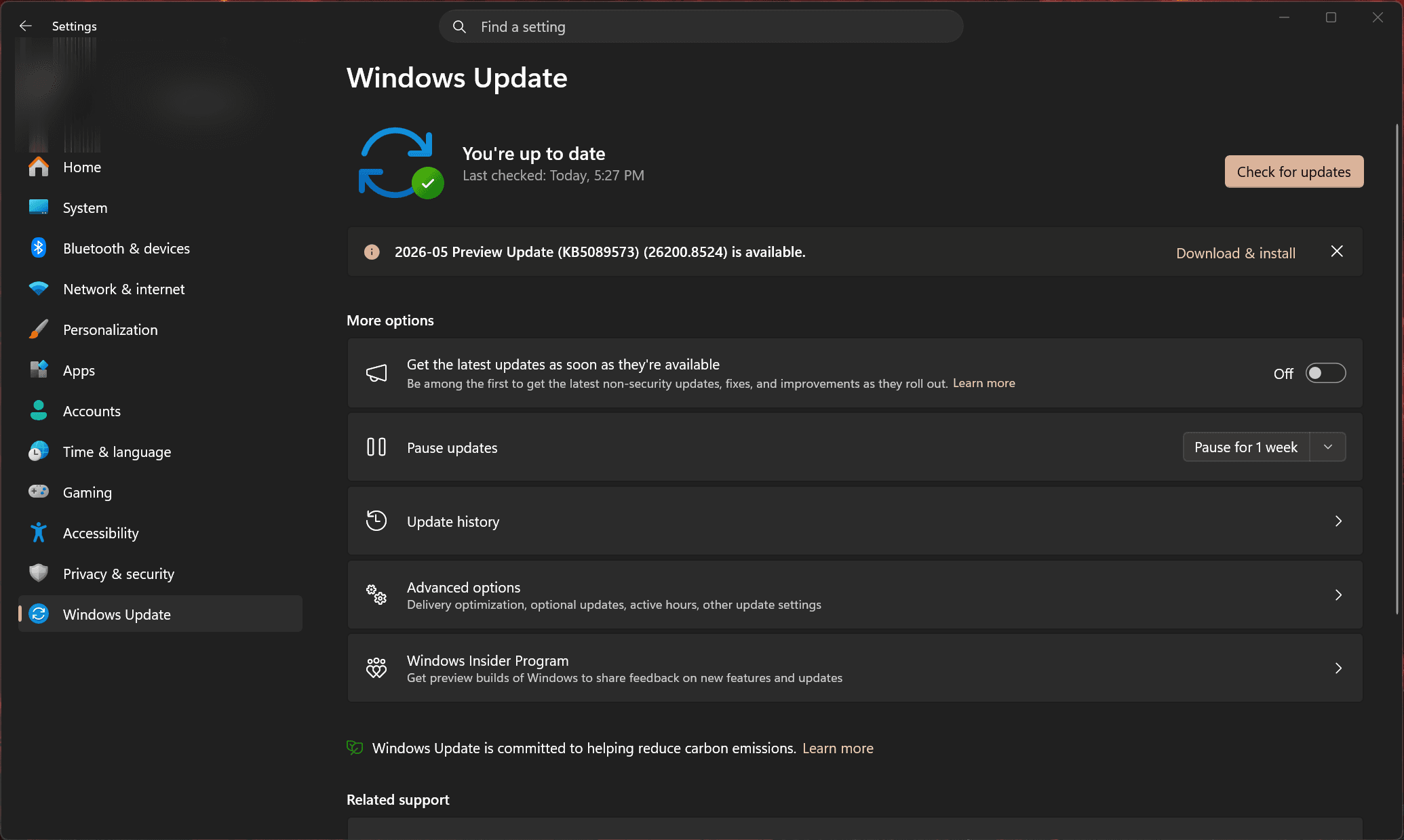 The Windows 11 Settings Windows Update page showing 'You're up to date', an available preview update, the Pause updates control, Update history, and Advanced options.